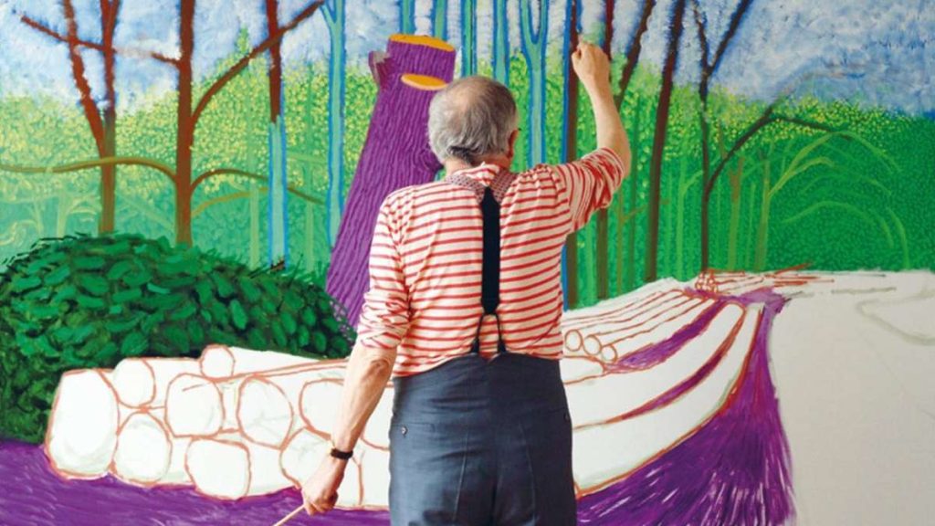 David Hockney in una scena del documentario A Bigger Picture