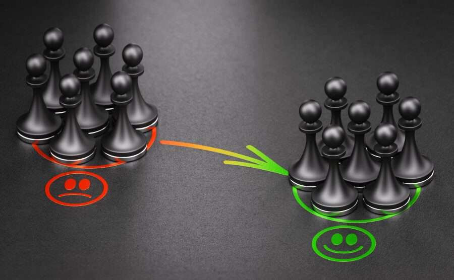Nell'immagine due insiemi di pedine sono uniti da una freccia. Il primo insieme, di colore rosso, rappresenta gli investimenti sostenibili, il secondo, di colore verde, quelli sostenibili