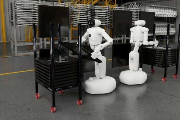 foto di robot umanoidi che spostano oggetti